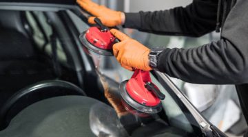 Auto Glass Repair and Replacement, close up. High quality photo